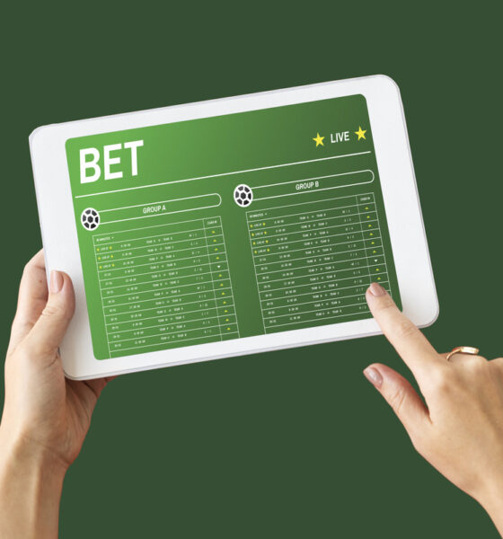 tablet com bet na tela; apostas